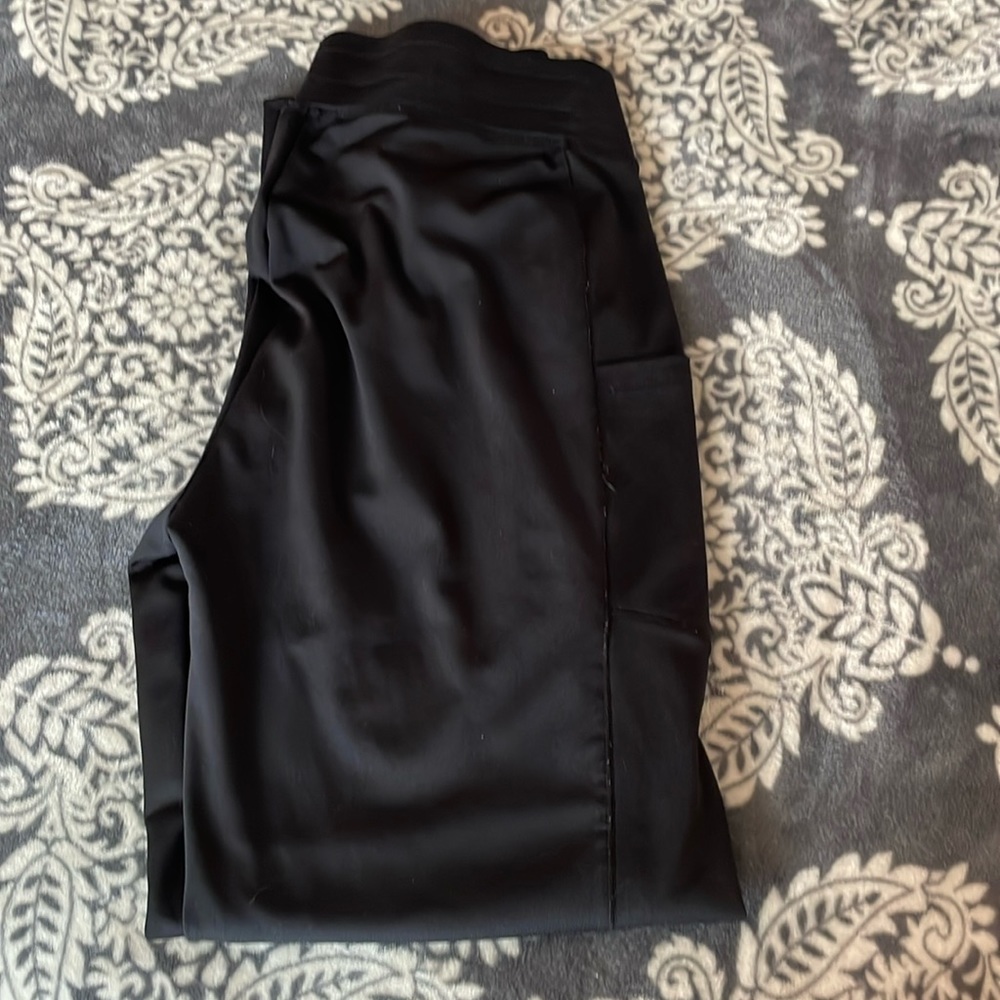 Black large lounge pants with deep pockets on both legs. Soft and comfy.